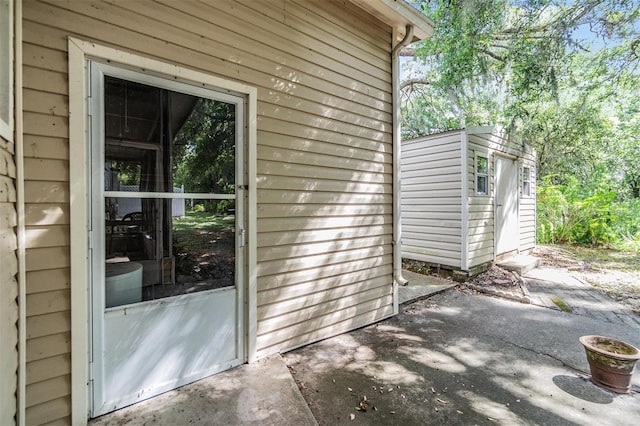 3542 Castle Dr, Zephyrhills, FL 33540 - property entrance with a patio area
