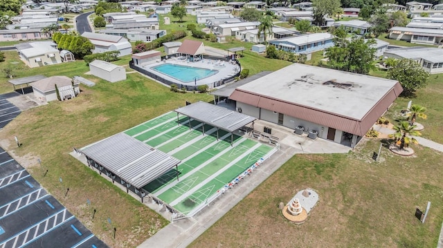 3542 Castle Dr, Zephyrhills, FL 33540 - aerial perspective of suburban area with a pool area