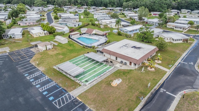 3542 Castle Dr, Zephyrhills, FL 33540 - aerial perspective of suburban area featuring a pool area