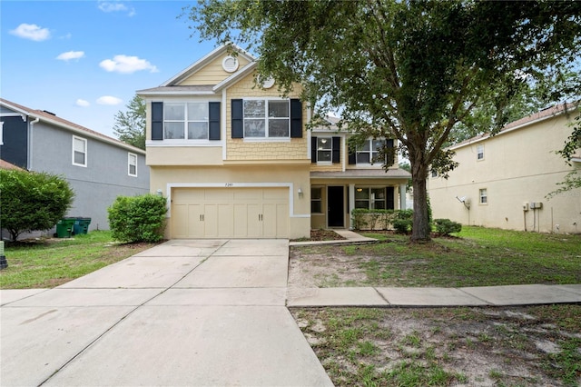 7249 Bridgeview Dr, Wesley Chapel, FL 33545 - view of front of house with a garage, driveway, and stucco siding