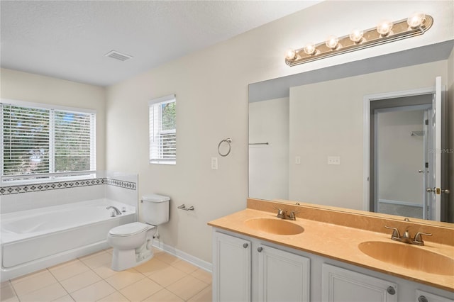 7249 Bridgeview Dr, Wesley Chapel, FL 33545 - full bath with a garden tub, double vanity, and tile patterned floors