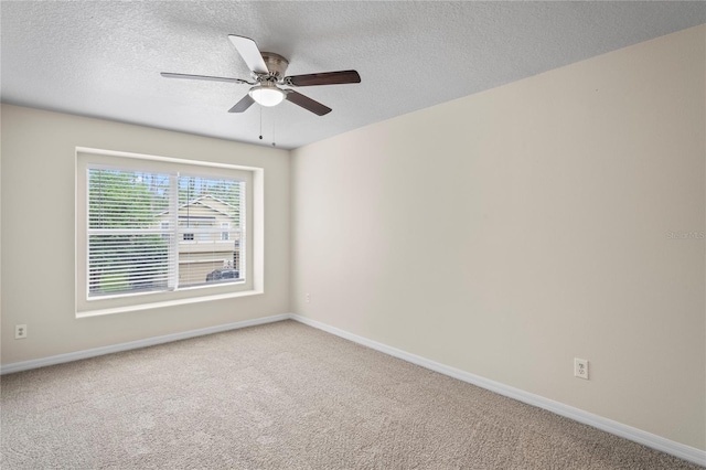 7249 Bridgeview Dr, Wesley Chapel, FL 33545 - carpeted empty room with ceiling fan and a textured ceiling