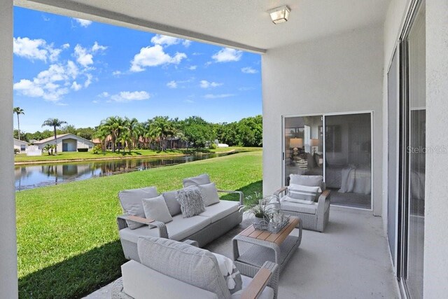 4921 Wessex Way, Land O Lakes, FL 34638 - view of patio / terrace with a water view and an outdoor hangout area