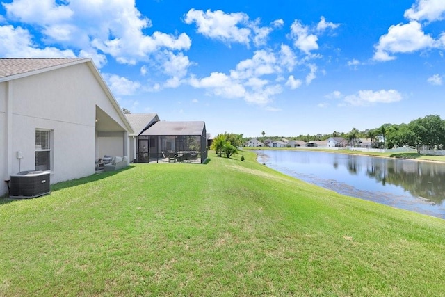 4921 Wessex Way, Land O Lakes, FL 34638 - view of green lawn with a water view and central AC