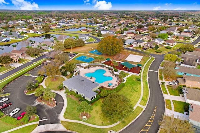 4921 Wessex Way, Land O Lakes, FL 34638 - aerial view of property's location featuring a nearby body of water, nearby suburban area, and a pool