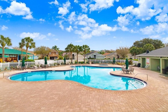 4921 Wessex Way, Land O Lakes, FL 34638 - community pool with a patio and a residential view