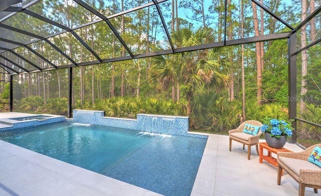 256 Stirling Bridge Dr, Ormond Beach, FL 32174 - view of swimming pool featuring a patio area, a pool with connected hot tub, and glass enclosure