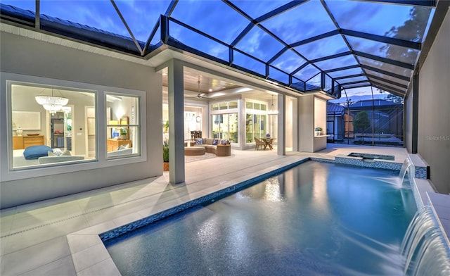 256 Stirling Bridge Dr, Ormond Beach, FL 32174 - view of swimming pool with a patio, outdoor lounge area, a pool with connected hot tub, and glass enclosure
