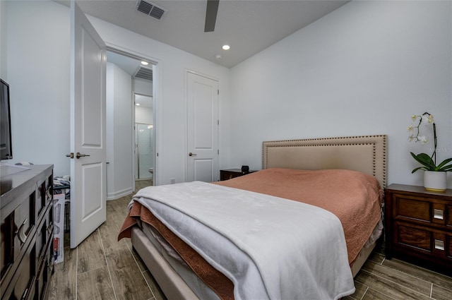 3952 Aldea Way, Wesley Chapel, FL 33543 - bedroom with wood finished floors, recessed lighting, ensuite bathroom, a ceiling fan, and baseboards