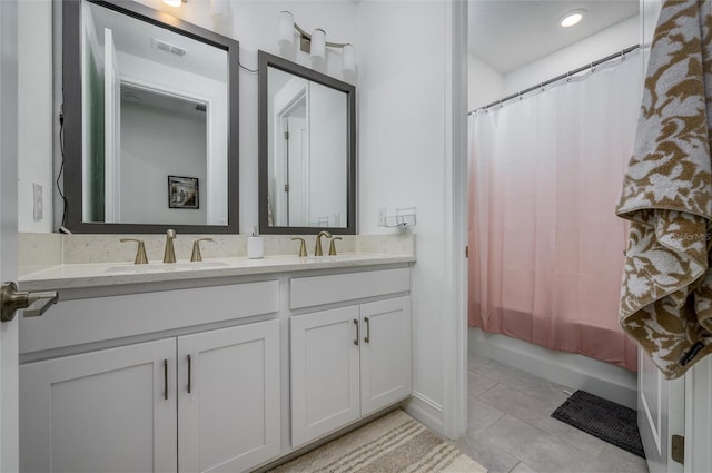 3952 Aldea Way, Wesley Chapel, FL 33543 - bathroom with double vanity, shower / bath combo, and tile patterned floors