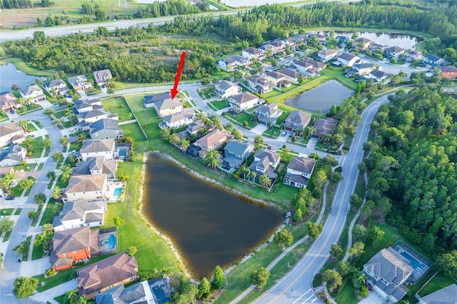 3952 Aldea Way, Wesley Chapel, FL 33543 - aerial overview of property's location featuring a large body of water and nearby suburban area