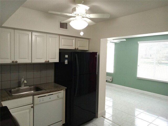 2447 Ecuadorian Way Unit 11, Clearwater, FL 33763 - kitchen with white dishwasher, freestanding refrigerator, a sink, white cabinetry, and a ceiling fan