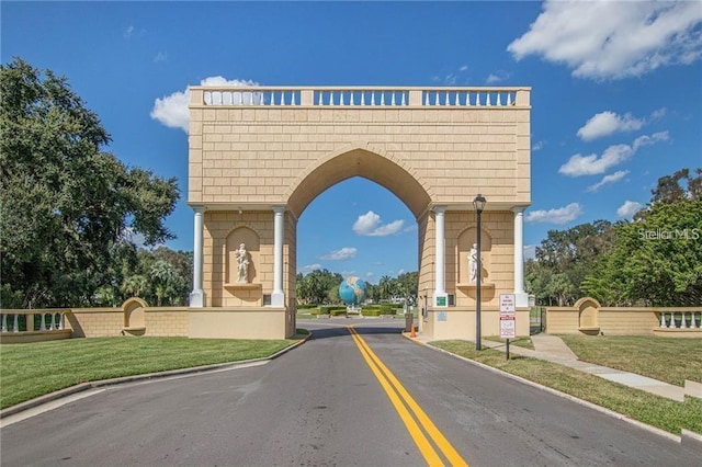 2447 Ecuadorian Way Unit 11, Clearwater, FL 33763 - view of asphalt street with curbs and street lights