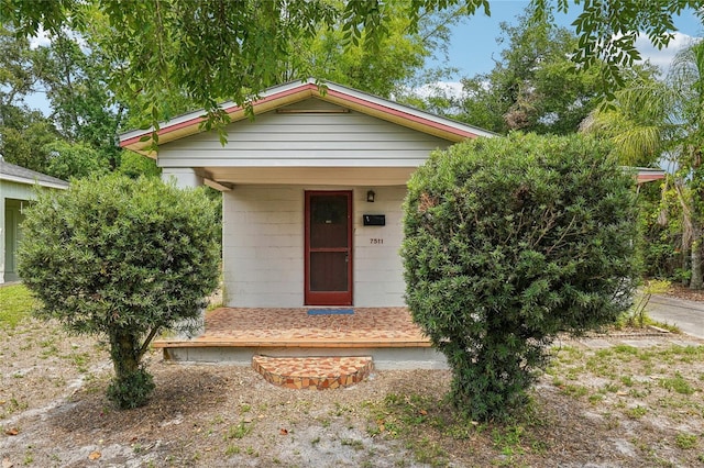 7511 N Ola Ave, Tampa, FL 33604 - view of front of home featuring a porch