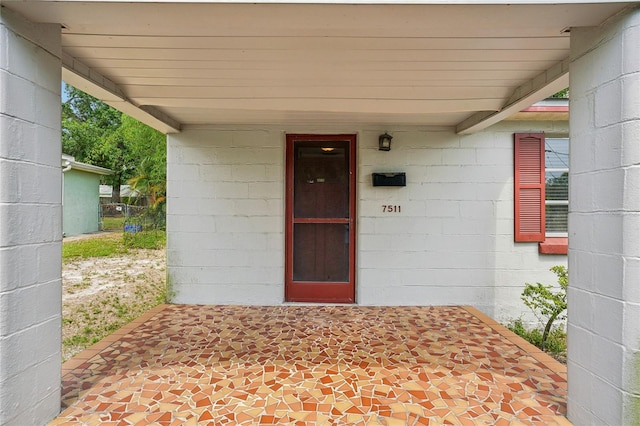 7511 N Ola Ave, Tampa, FL 33604 - entrance to property featuring concrete block siding