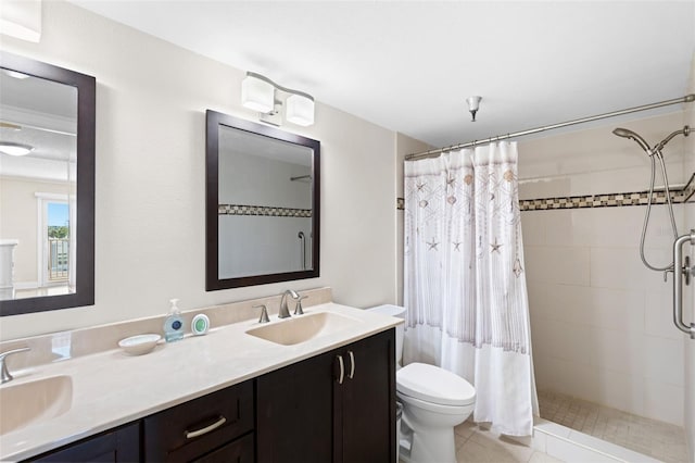 13440 Gulf Blvd Unit 202, Madeira Beach, FL 33708 - full bathroom featuring double vanity, a tile shower, toilet, and tile patterned flooring