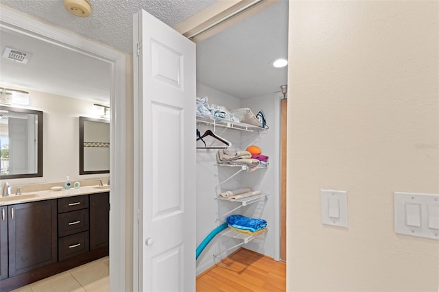 13440 Gulf Blvd Unit 202, Madeira Beach, FL 33708 - walk in closet with a sink