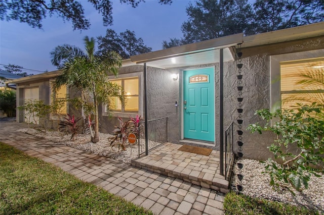 4324 S Clark Ave, Tampa, FL 33611 - entrance to property featuring stucco siding