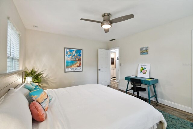 4324 S Clark Ave, Tampa, FL 33611 - bedroom featuring wood finished floors, baseboards, and a ceiling fan