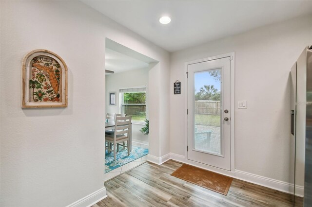 4324 S Clark Ave, Tampa, FL 33611 - entryway with baseboards, wood finished floors, and recessed lighting