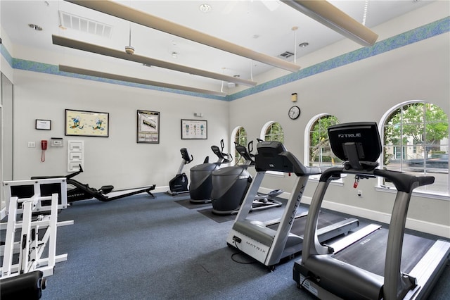 501 Knights Run Ave Unit 5103, Tampa, FL 33602 - exercise room featuring beamed ceiling and baseboards