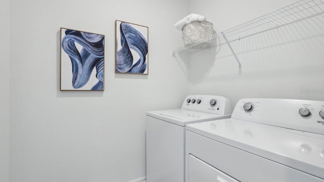 4401 Sand Dollar Way, Zephyrhills, FL 33541 - laundry area with independent washer and dryer
