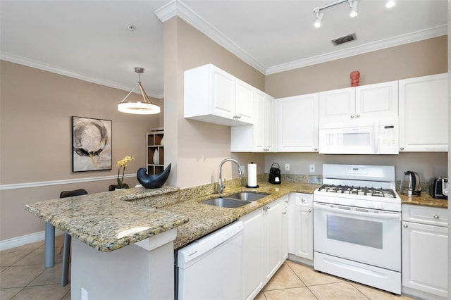 2705 Via Murano Unit 127, Clearwater, FL 33764 - kitchen with white appliances, a sink, light tile patterned flooring, a peninsula, and white cabinets