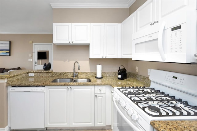 2705 Via Murano Unit 127, Clearwater, FL 33764 - kitchen featuring white appliances, a sink, white cabinetry, light stone countertops, and crown molding