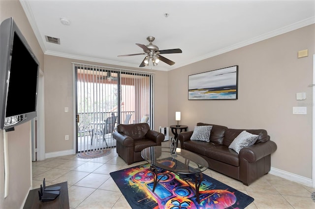 2705 Via Murano Unit 127, Clearwater, FL 33764 - living area featuring light tile patterned flooring, baseboards, a ceiling fan, and crown molding