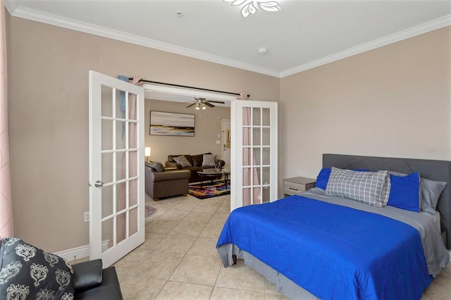 2705 Via Murano Unit 127, Clearwater, FL 33764 - bedroom featuring french doors, crown molding, and tile patterned floors