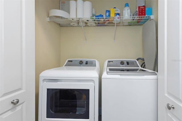 2705 Via Murano Unit 127, Clearwater, FL 33764 - washroom with washing machine and dryer