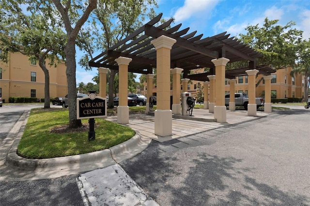 2705 Via Murano Unit 127, Clearwater, FL 33764 - view of home's community with a pergola