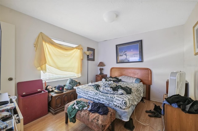 108 Shore Dr, Tarpon Springs, FL 34689 - bedroom featuring light wood-style flooring