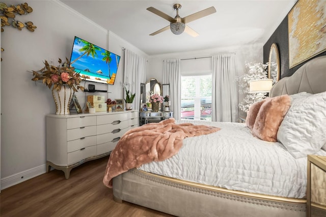 5332 Riverwalk Preserve Dr, New Port Richey, FL 34653 - bedroom featuring wood finished floors, baseboards, ornamental molding, and ceiling fan