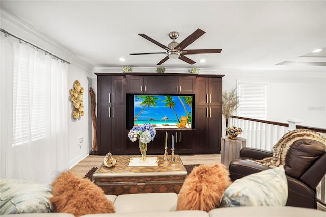 5332 Riverwalk Preserve Dr, New Port Richey, FL 34653 - living room with ceiling fan, light wood finished floors, ornamental molding, recessed lighting, and baseboards
