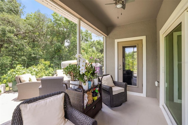 5332 Riverwalk Preserve Dr, New Port Richey, FL 34653 - view of patio / terrace with a ceiling fan and view of scattered trees
