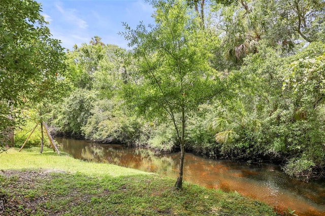 5332 Riverwalk Preserve Dr, New Port Richey, FL 34653 - view of yard featuring a wooded view