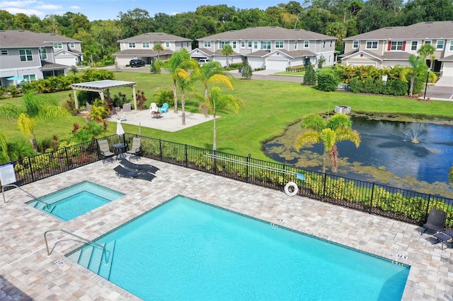 5332 Riverwalk Preserve Dr, New Port Richey, FL 34653 - community pool featuring a residential view, a patio area, a community hot tub, and a water view