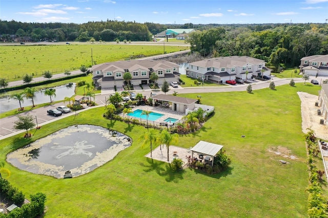 5332 Riverwalk Preserve Dr, New Port Richey, FL 34653 - drone / aerial view of a pool area and a nearby body of water