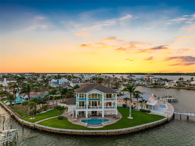 11000 8th St E, Treasure Island, FL 33706 - view from above of property with a nearby body of water and a pool area
