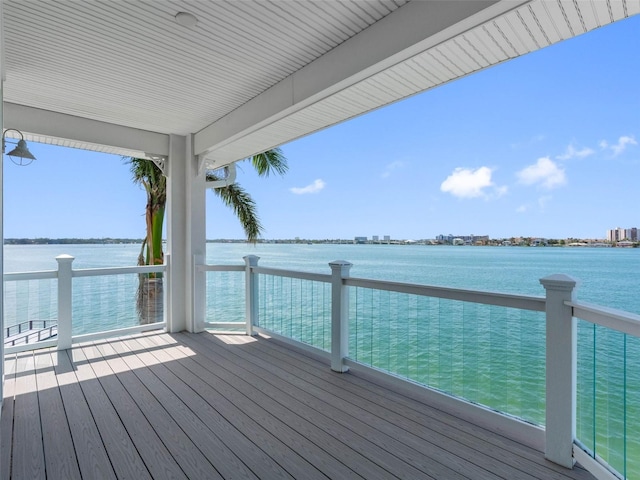 11000 8th St E, Treasure Island, FL 33706 - dock featuring a deck with water view