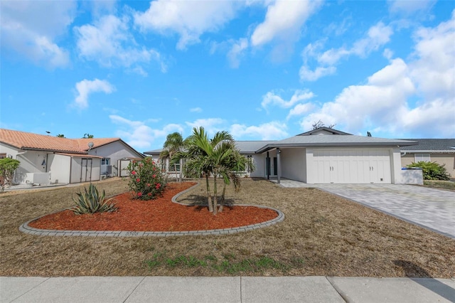 6508 Senegal Palm Way, Apollo Beach, FL 33572 - ranch-style house featuring driveway and an attached garage