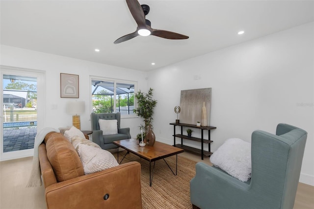 6508 Senegal Palm Way, Apollo Beach, FL 33572 - living room with ceiling fan, recessed lighting, and baseboards
