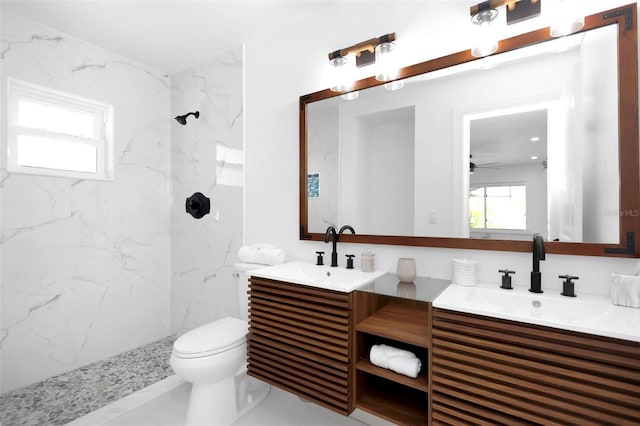 6508 Senegal Palm Way, Apollo Beach, FL 33572 - full bath featuring a marble finish shower, double vanity, healthy amount of natural light, and toilet