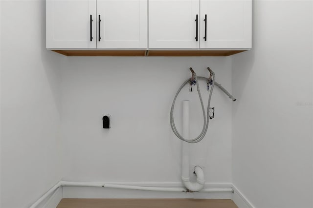 6508 Senegal Palm Way, Apollo Beach, FL 33572 - laundry area featuring hookup for a washing machine and cabinet space
