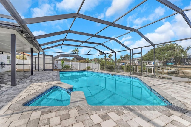 6508 Senegal Palm Way, Apollo Beach, FL 33572 - swimming pool featuring an in-ground hot tub, a patio, and a lanai
