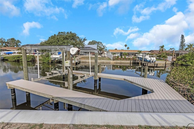 6508 Senegal Palm Way, Apollo Beach, FL 33572 - dock featuring boat lift and a water view