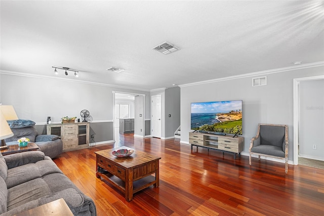 3351 Lintower Dr, Land O Lakes, FL 34638 - living area featuring stairway, wood finished floors, ornamental molding, and baseboards