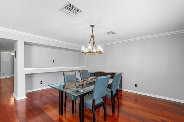 3351 Lintower Dr, Land O Lakes, FL 34638 - dining room featuring a chandelier, hardwood / wood-style flooring, ornamental molding, and baseboards