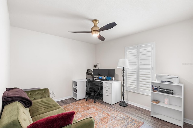 3351 Lintower Dr, Land O Lakes, FL 34638 - office featuring ceiling fan, wood finished floors, and baseboards